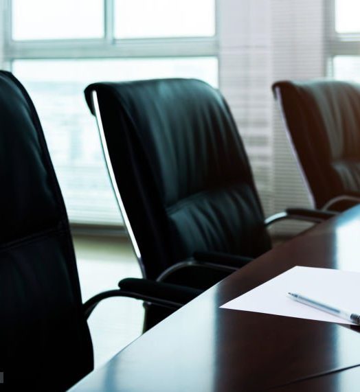 white paper with pens in the meeting room